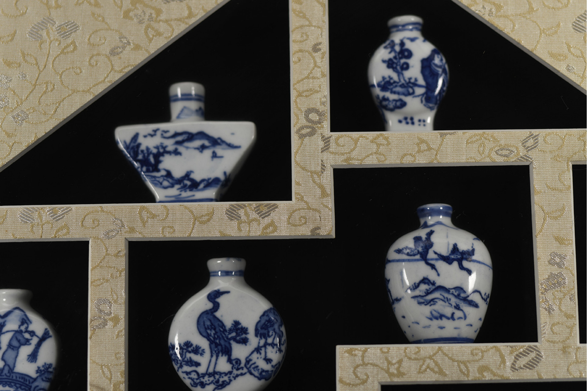 Framed Set of Porcelain Vases