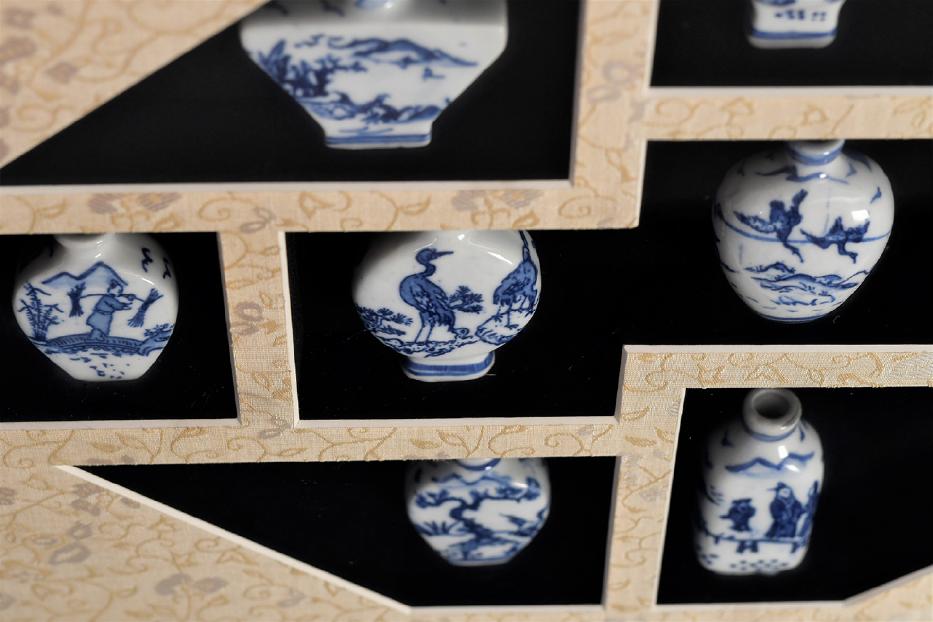 Framed Set of Porcelain Vases