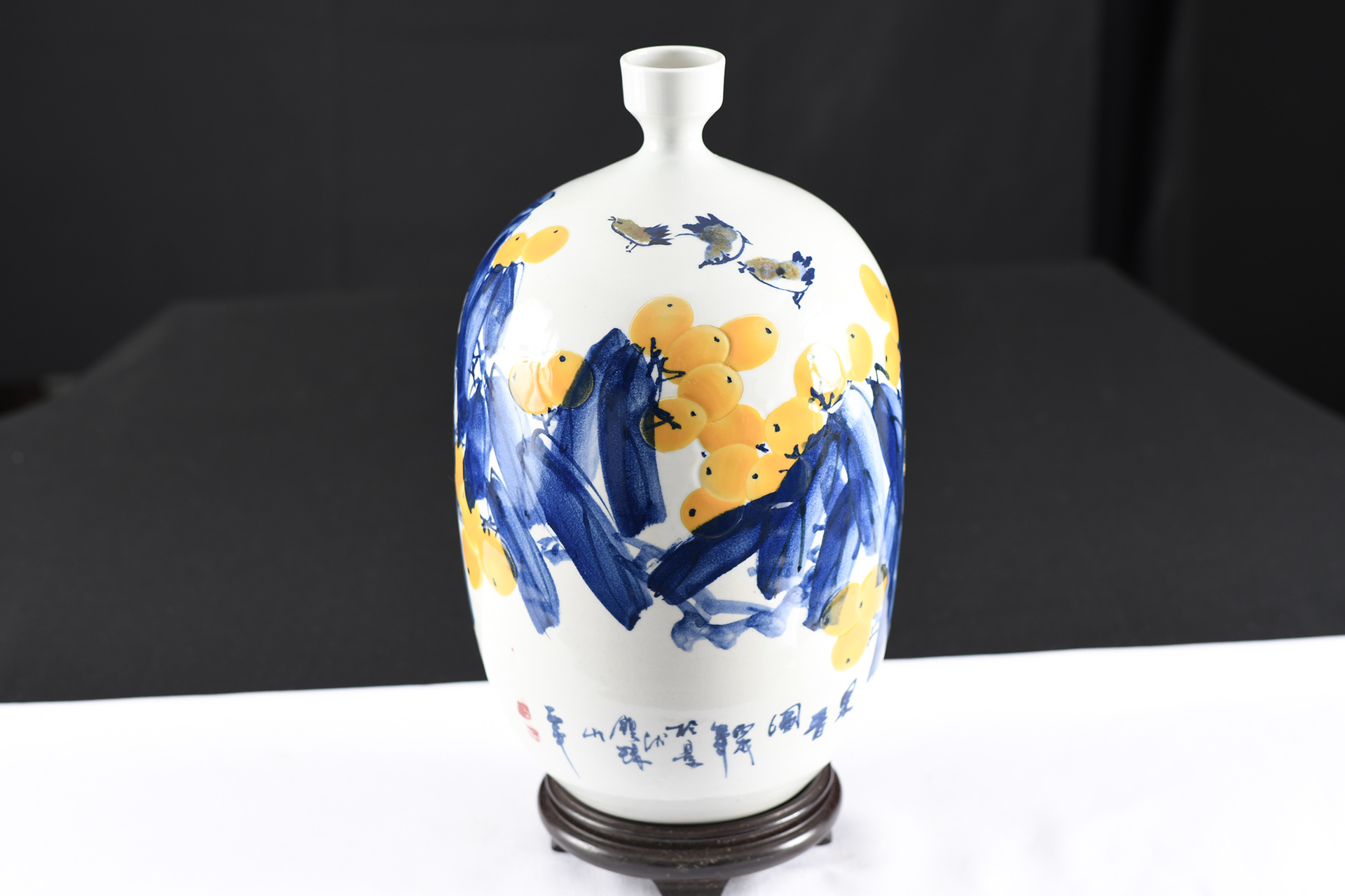 White Porcelain Vase with Hand Painted Yellow and Blue Floral Design