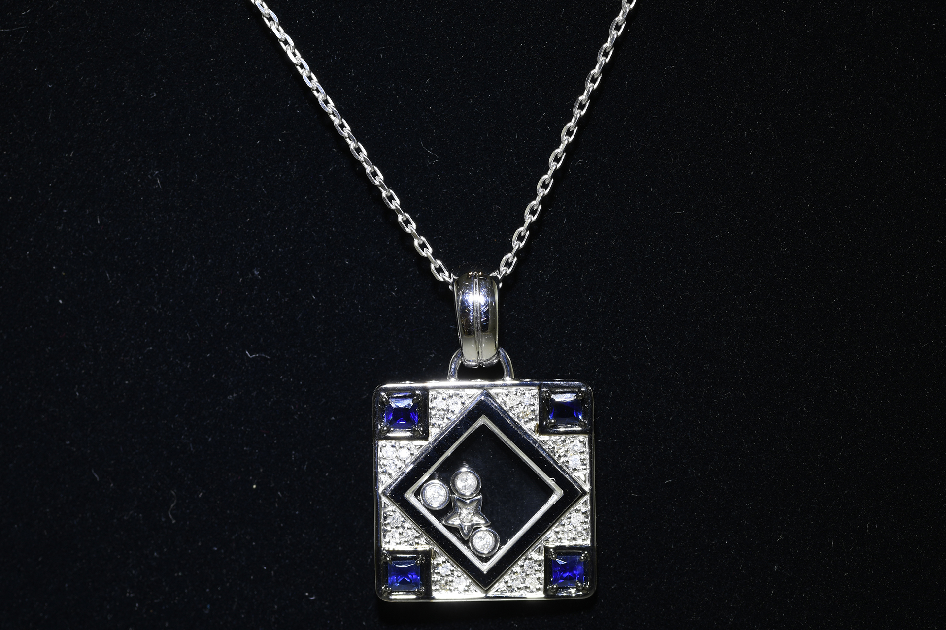 18 carat White Gold Sapphire & Diamond Pendant