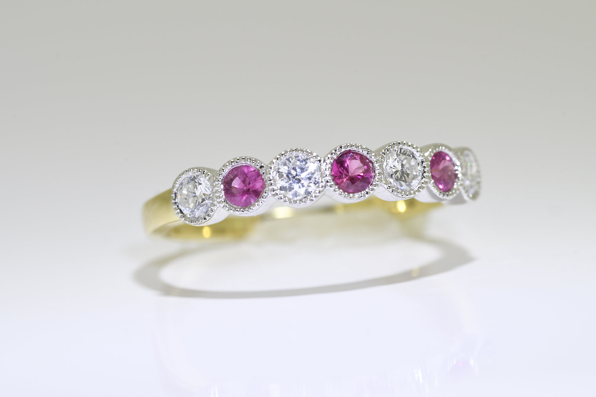 Ruby & Diamond Ring set in 18 carat yellow gold.