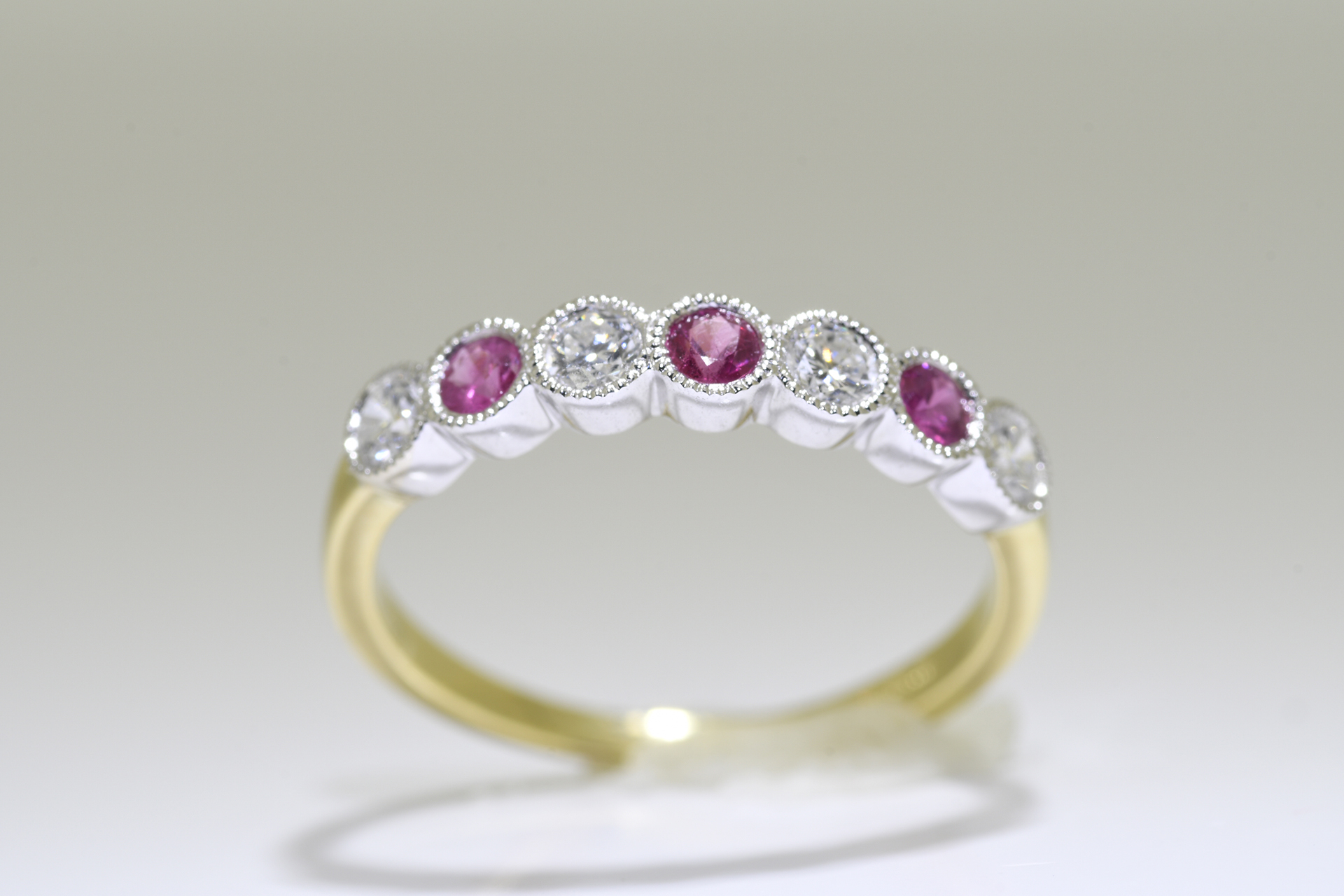 Ruby & Diamond Ring set in 18 carat yellow gold.