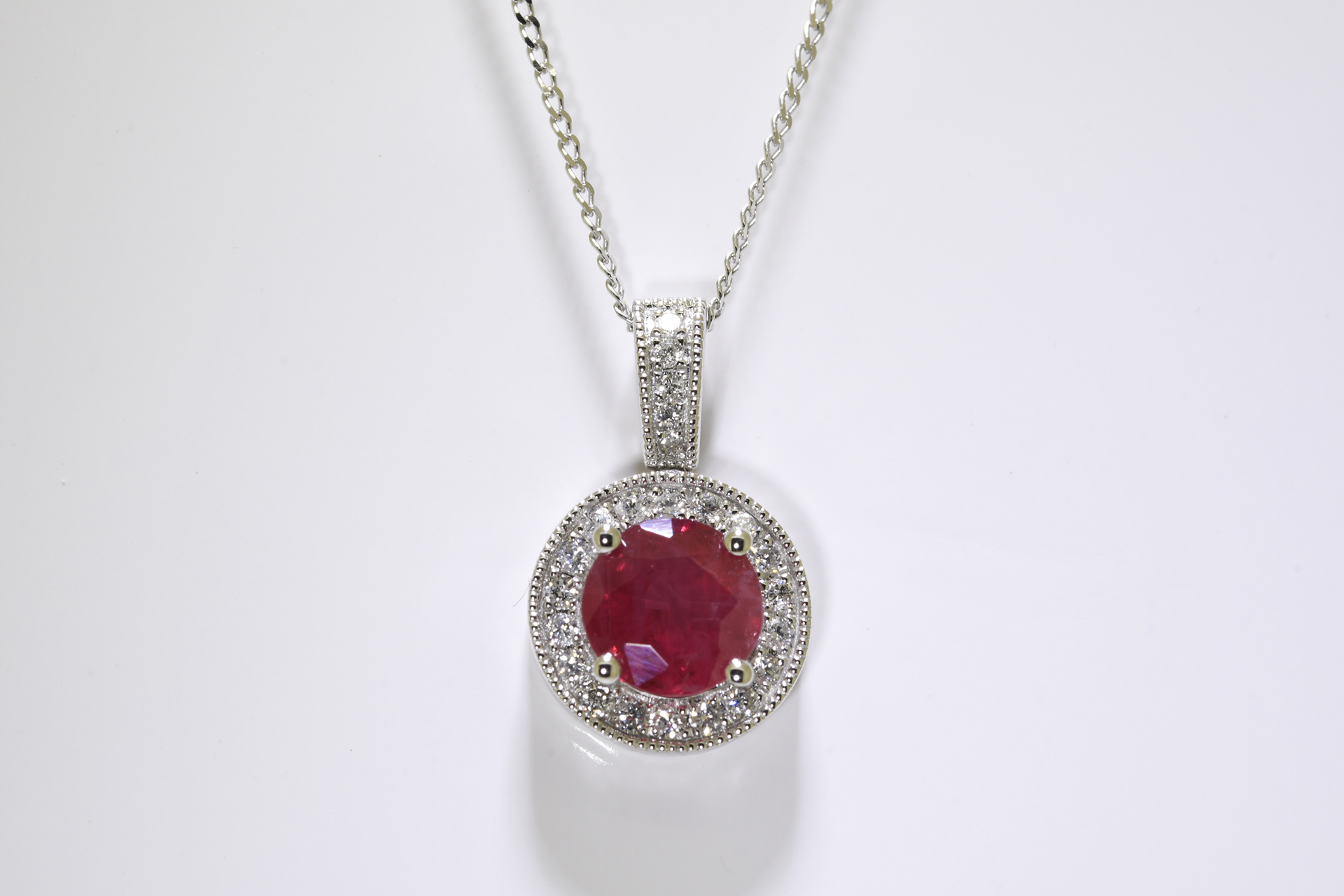 Ruby & Diamond Pendant set in 18 carat white gold